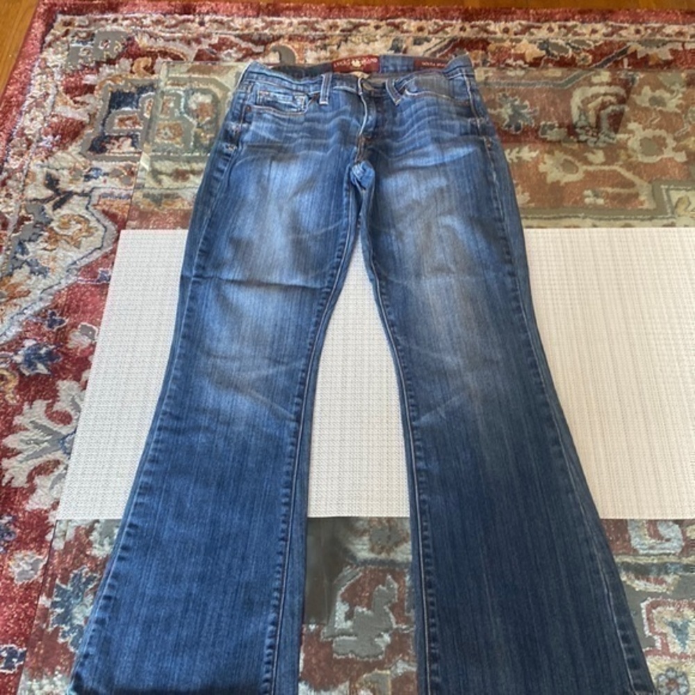 Lucky brand jeans 👖 i think is a vintage jeans, SOFIA BOOTS ,size 4/27